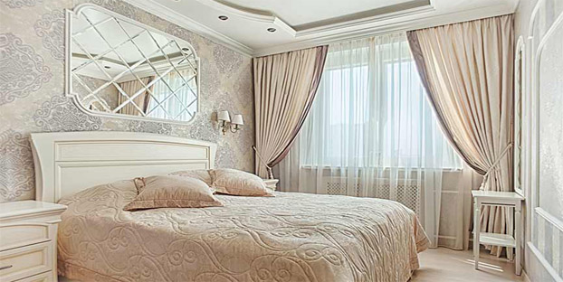 Beige curtains in the bedroom