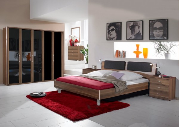 lovely-modern-bedroom-design-with-wooden-closet-feat-glossy-dark-glass-door-and-wooden-dress-cabinet-and-mirror-915x646