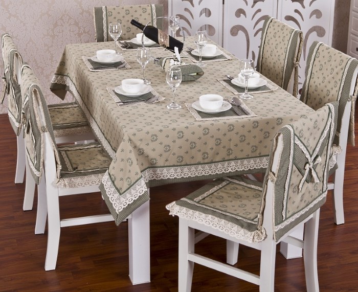 Throw covers with a pattern on the chairs for the kitchen