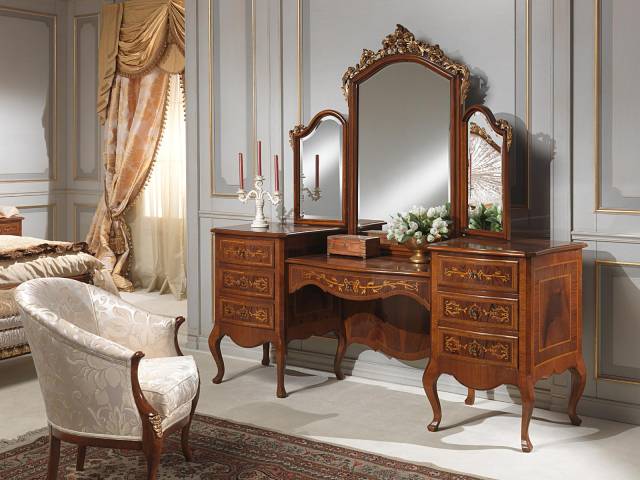 Stylistic injection of furniture with an old-style mirror into the bedroom