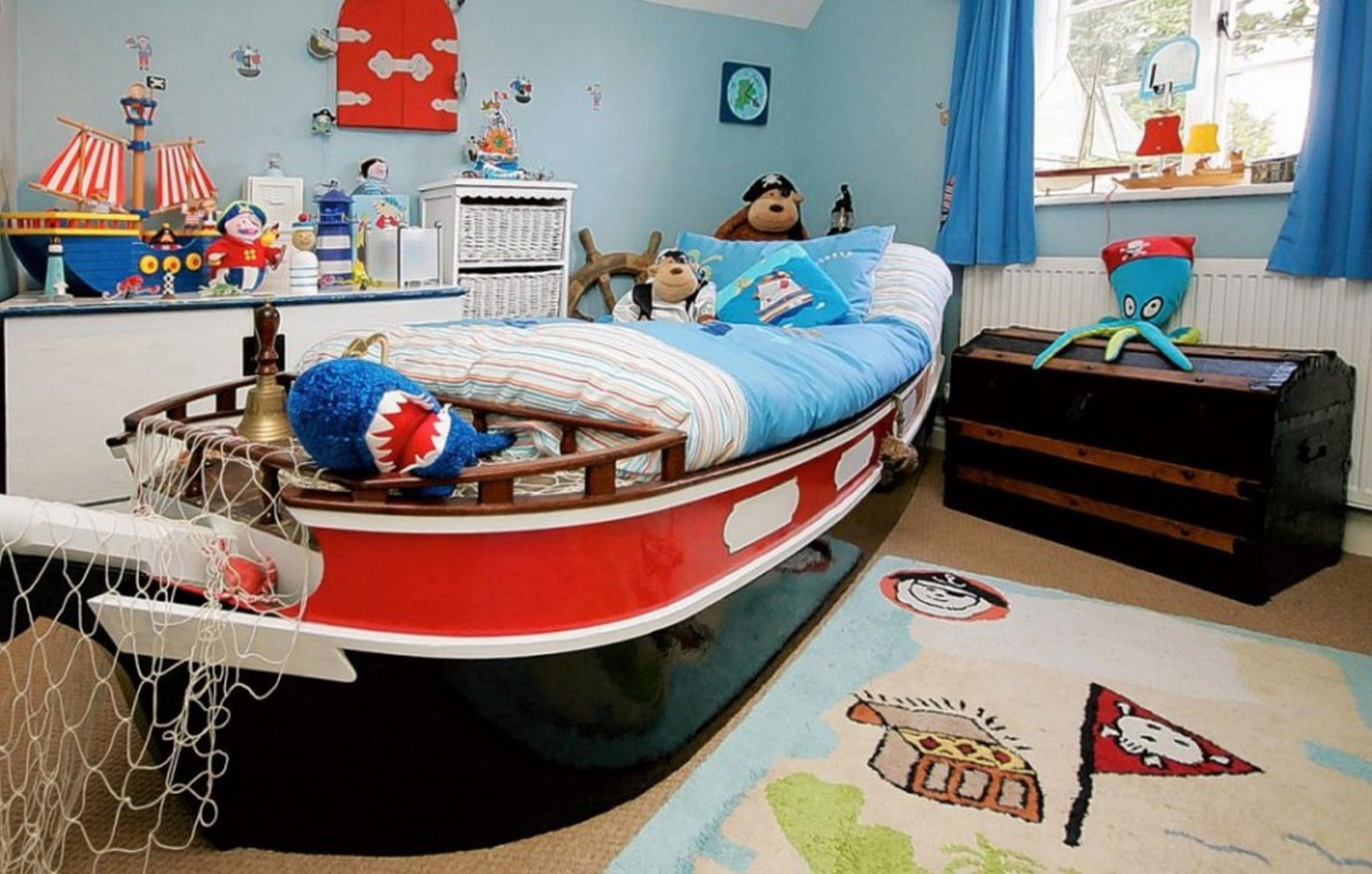 Photo of the design of a children's room in a marine style for a boy