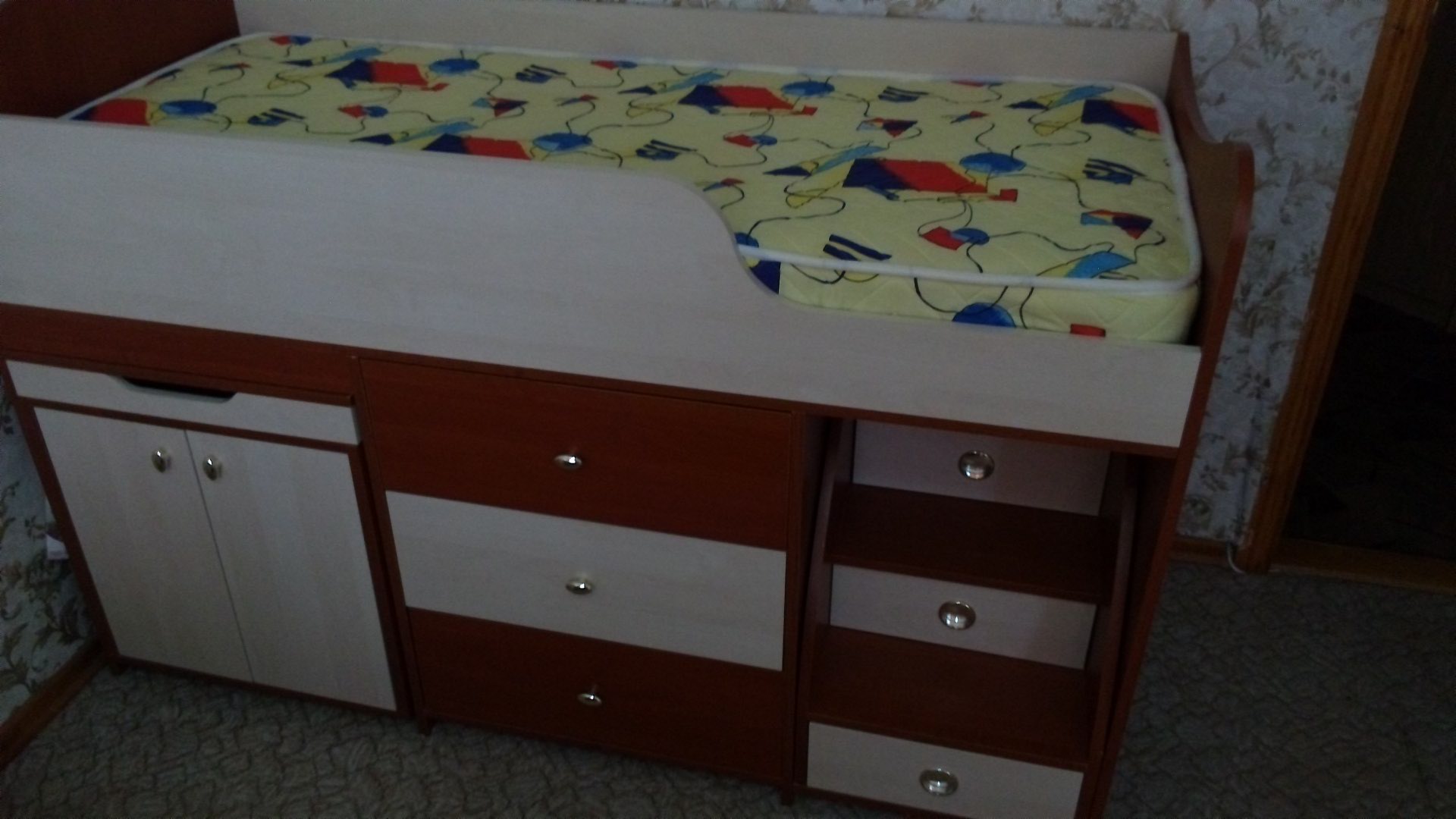 Massive children's bed with built-in chest