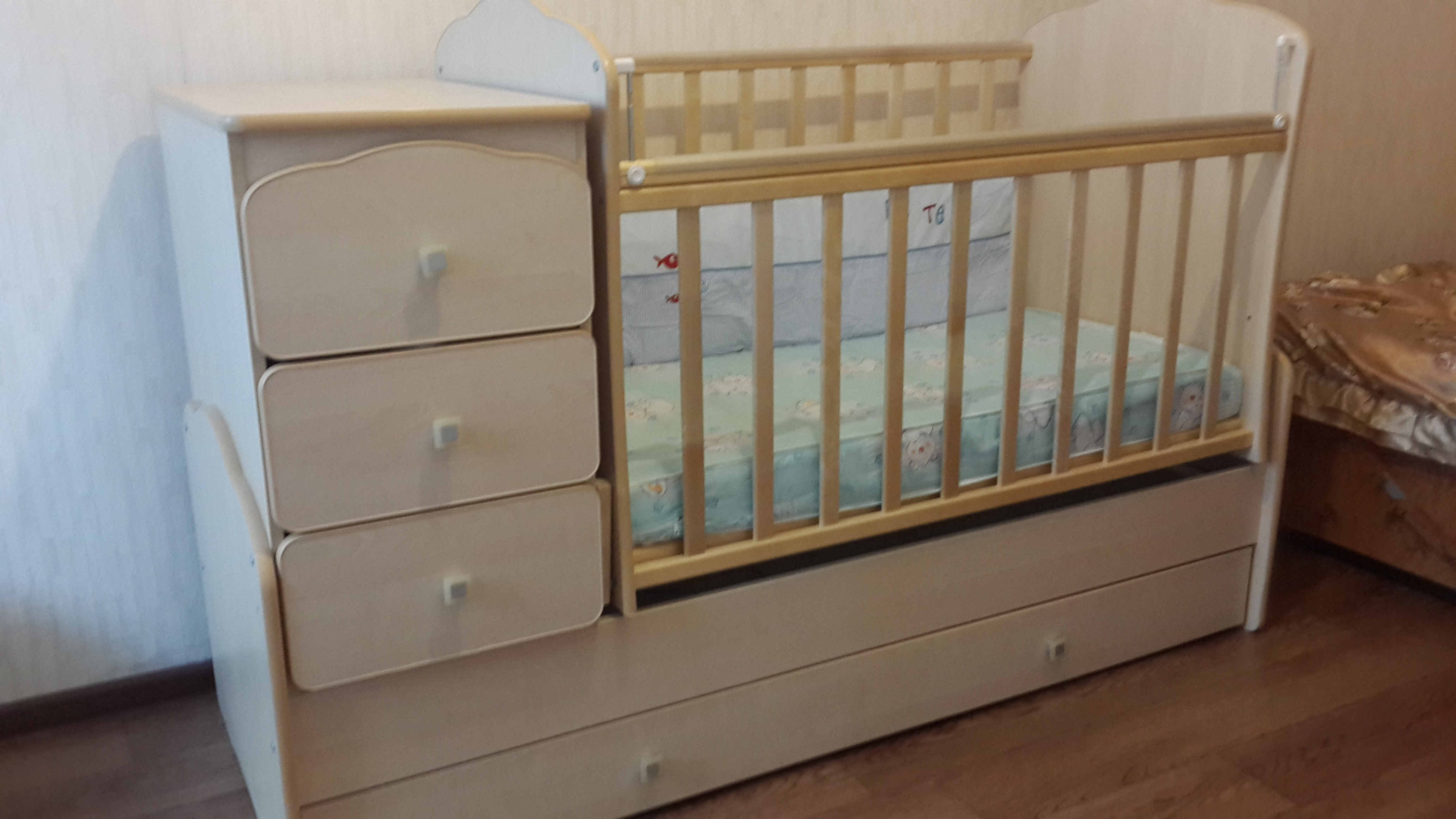 Children's bed a transformer with a changing table