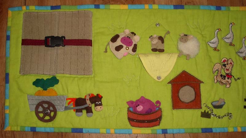 Developmental mat with buttons and buttons for children