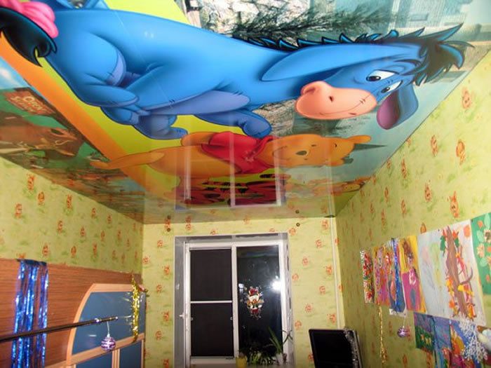 Stretch ceiling with cartoon characters for a child’s room
