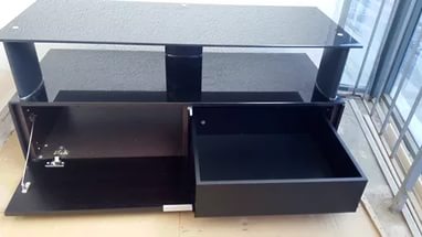 Dark TV stand with drawer