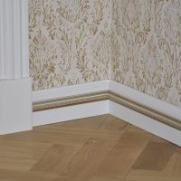 white foam baseboard in the interior of the house picture
