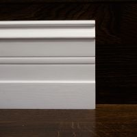 white foam baseboard in the interior of the apartment photo