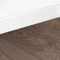 bright wooden baseboard in the interior of the apartment photo