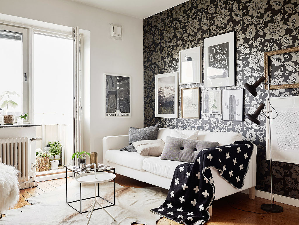 black wallpaper in the design of the living room in the style of avant-garde