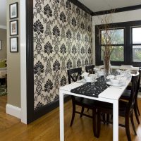 black wallpaper in the interior of the living room in the loft style photo