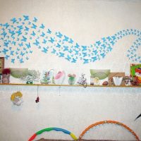 unusual butterflies in the decor of a child’s picture