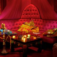 bright decor of the living room in ethnic style picture