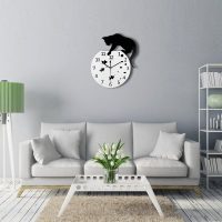 plastic clock in the kitchen in the country style photo
