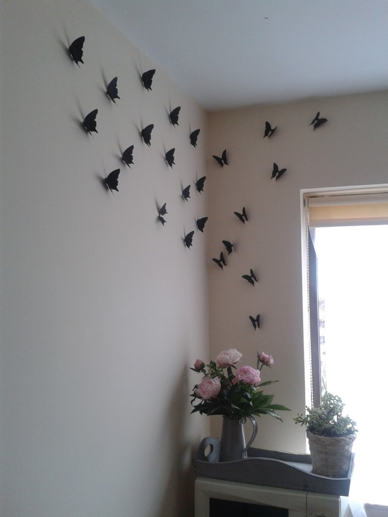 unusual butterflies in the decor of the corridor