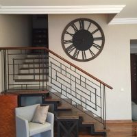 minimalism metal clock in the living room photo