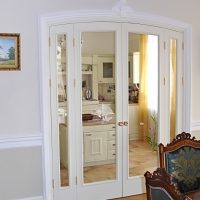 white doors in a design with a touch of pink picture