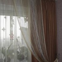 unusual curtains of the thread in the design of the bedroom photo