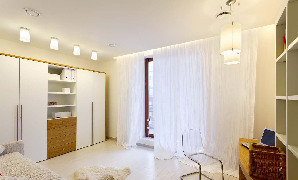 bright white floor in the design of the bedroom