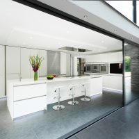 bright kitchen design in high-tech style photo