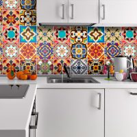 bright apron from large format tiles with the image in the decor of the kitchen photo