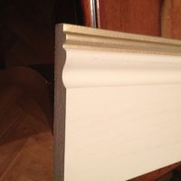 white plastic baseboard in the interior of the house picture