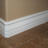 bright baseboard made of wood in the interior of the house picture