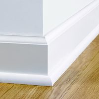 white plastic baseboard in the interior of the room photo