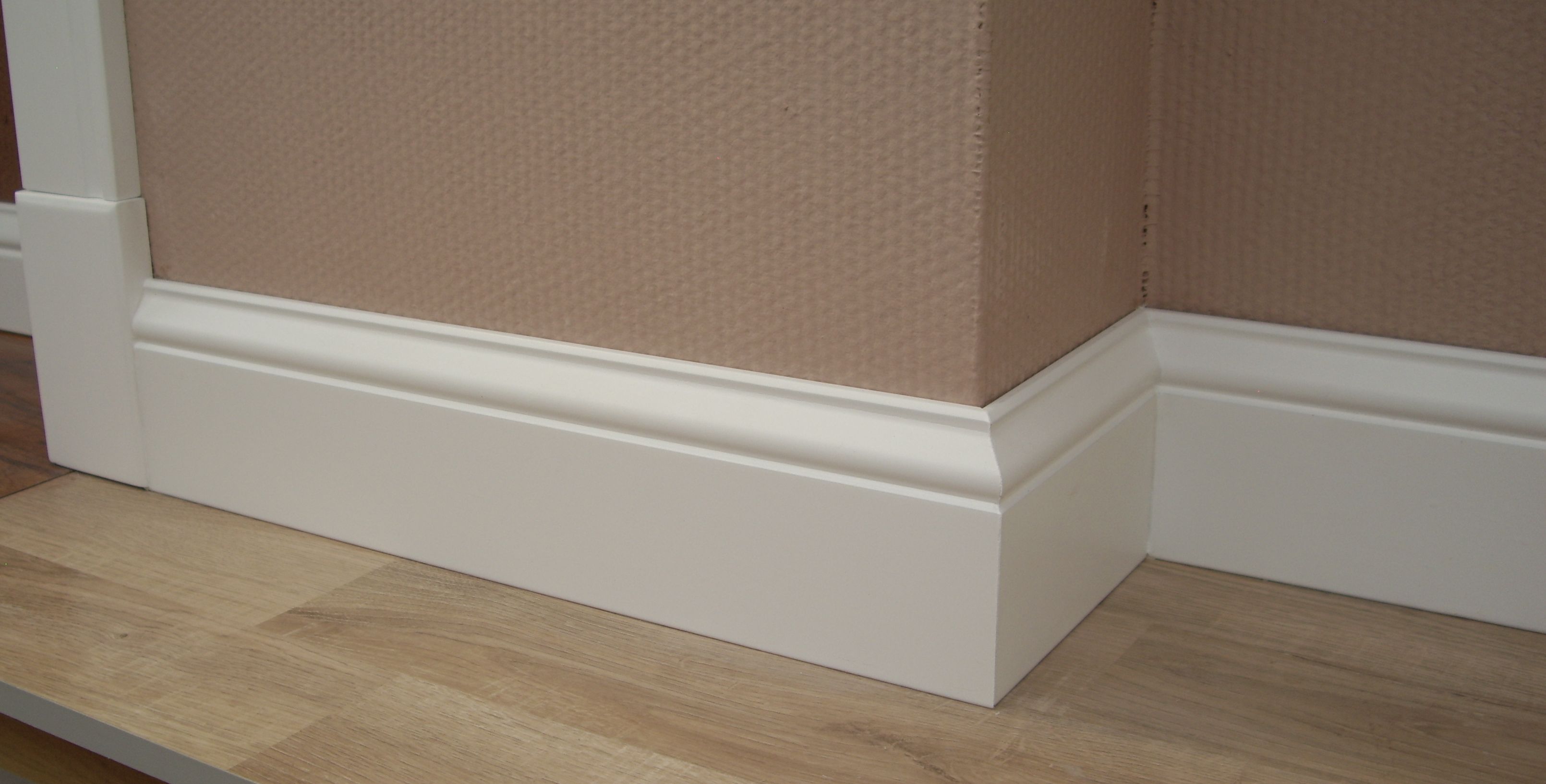 white plastic baseboard in the interior of the house