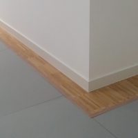 bright skirting board from LDF in the interior of the room photo