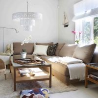 bright corner sofa in the design of the living room picture