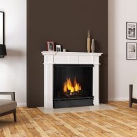 double-sided electric fireplace in the bedroom photo