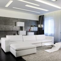bright sofa in the design of the bedroom photo