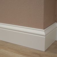 white foam baseboard in the interior of the house photo
