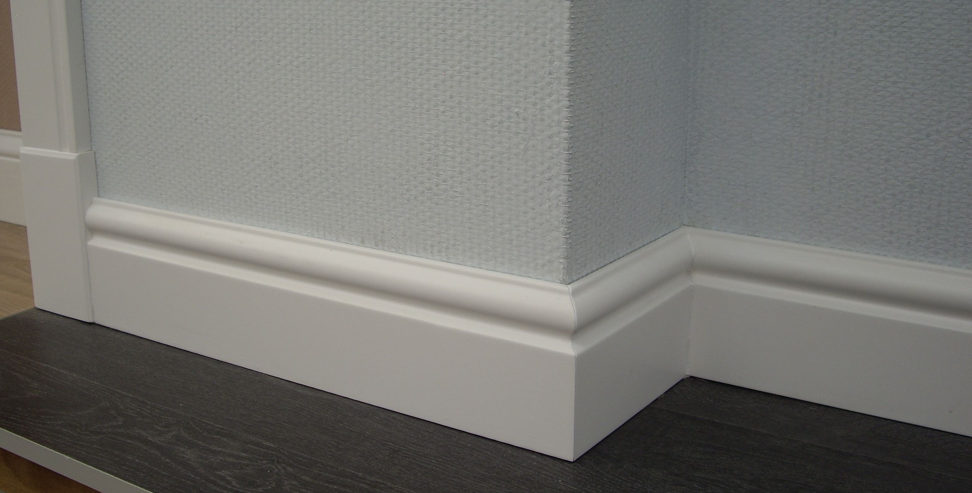 white skirting board made of LDF in the interior of the room