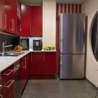 small refrigerator in the design of the kitchen in multi-colored color photo