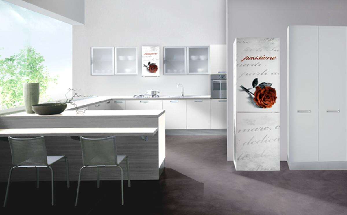 small refrigerator in the interior of the kitchen in steel color