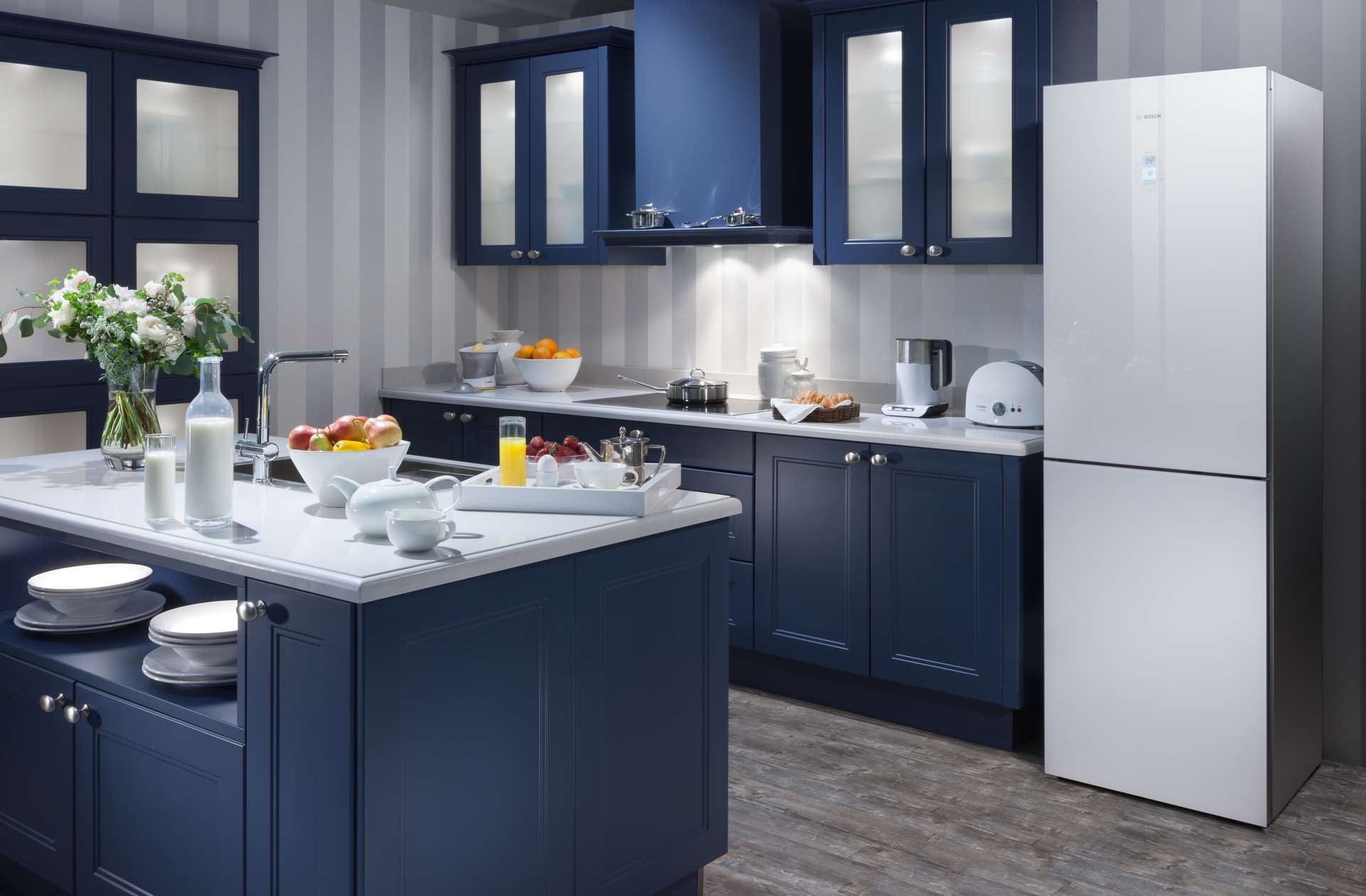 large refrigerator in the design of the kitchen in light color