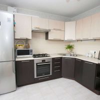 large refrigerator in the design of the kitchen in steel color picture