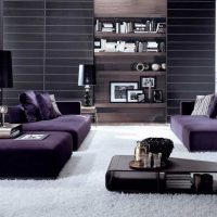 dark purple sofa in the decor of the apartment photo