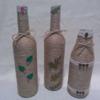 the idea of ​​the original design of champagne bottles with twine photo