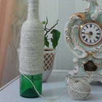 a variant of the original design of glass bottles with twine picture
