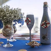the idea of ​​chic decoration of glass bottles with twine photo