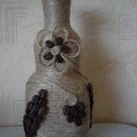idea of ​​bright decoration of champagne bottles with twine photo