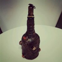 do-it-yourself option of beautifully decorating glass bottles of leather with your own hands picture