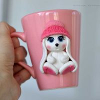 beautiful do-it-yourself mug decoration with polymer clay animals photo