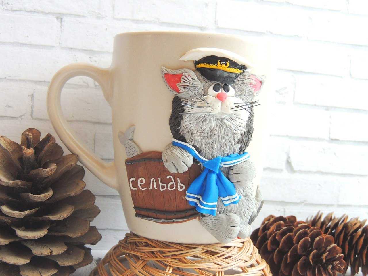 unusual decoration of the mug with polymer clay animals at home