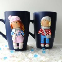 bright decoration of the mug with polymer clay animals at home photo