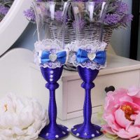 bright decoration of champagne bottles with decorative ribbons picture