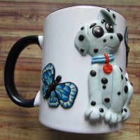 bright mug decoration with polymer clay flowers at home photo